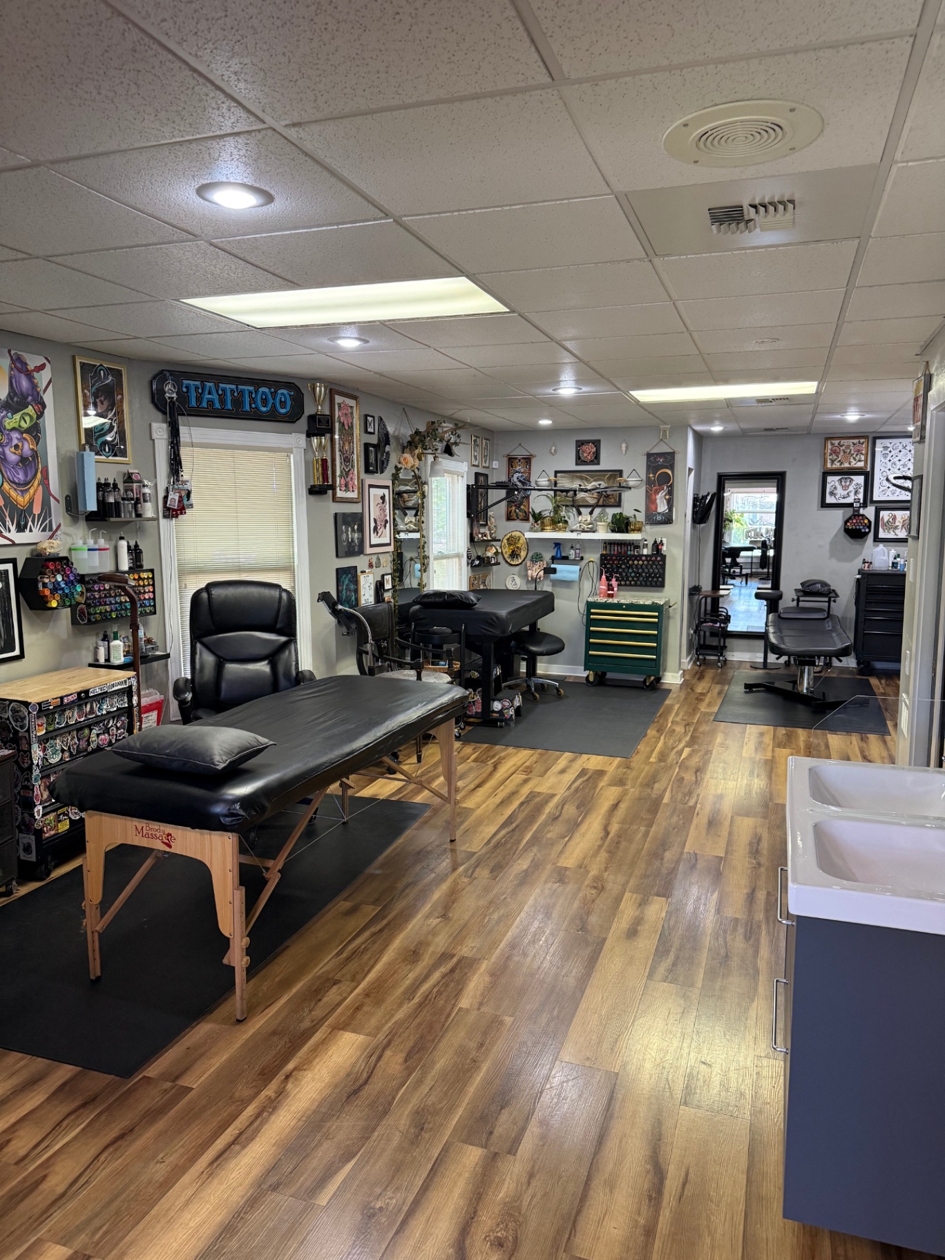 Still Gold Tattoo main tattoo floor with multiple stations